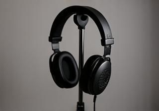 Pair of professional studio monitoring headphones on a stand